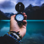 man with compass